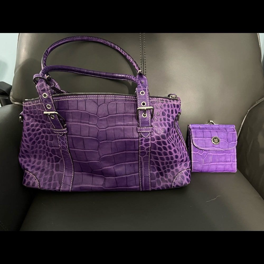 Dooney and Burke alligator leather purse and matching wallet. Never used brand